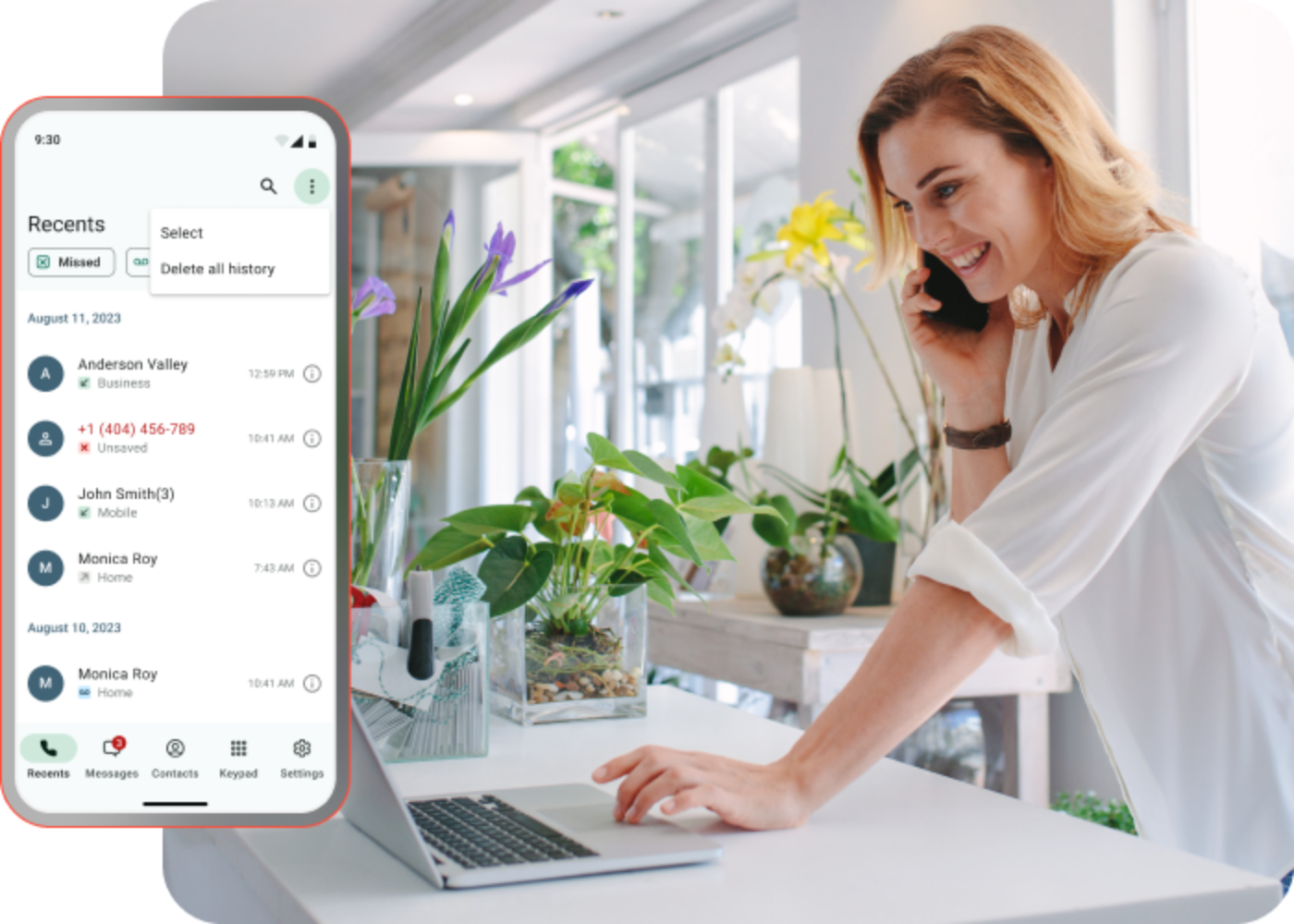 Woman looking at laptop while speaking on the phone